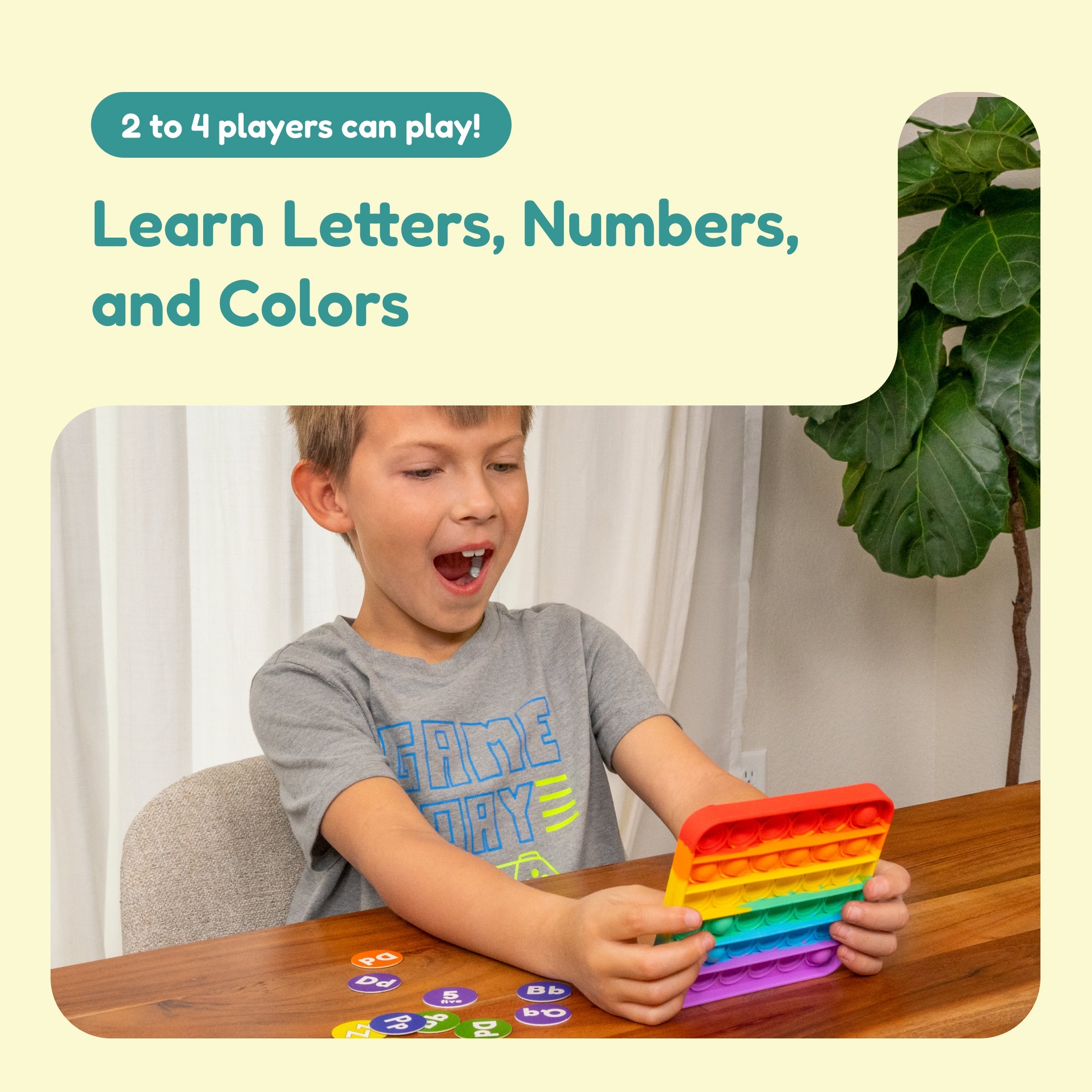 Child playing with the ABC Bingo rainbow letter board