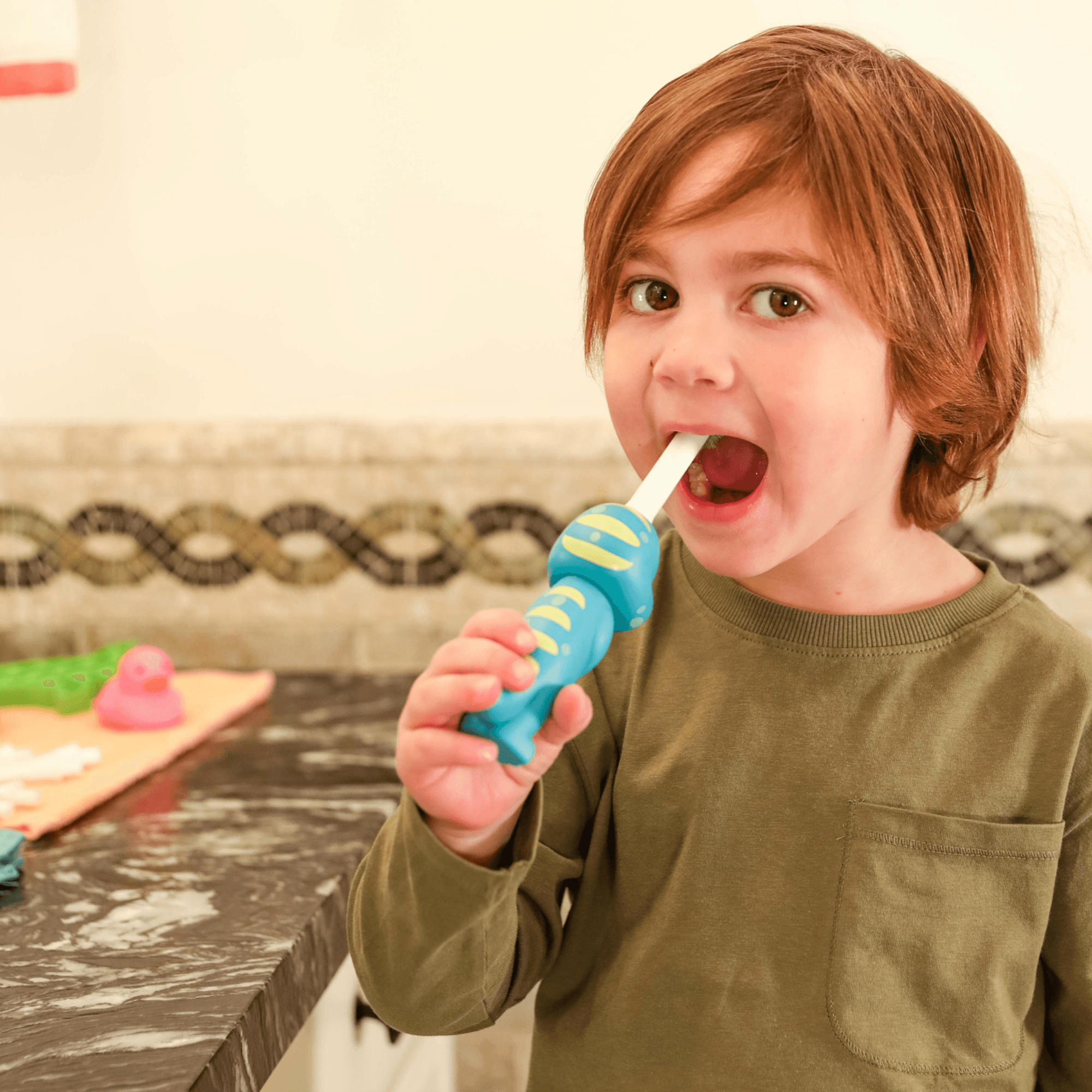 Brushy dinosaur toothbrush handle and soft bristles